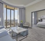 One_Bedroom_Beverly_Suite_with_Balcony_and_View_Bedroom_+_Living_Room1.jpg